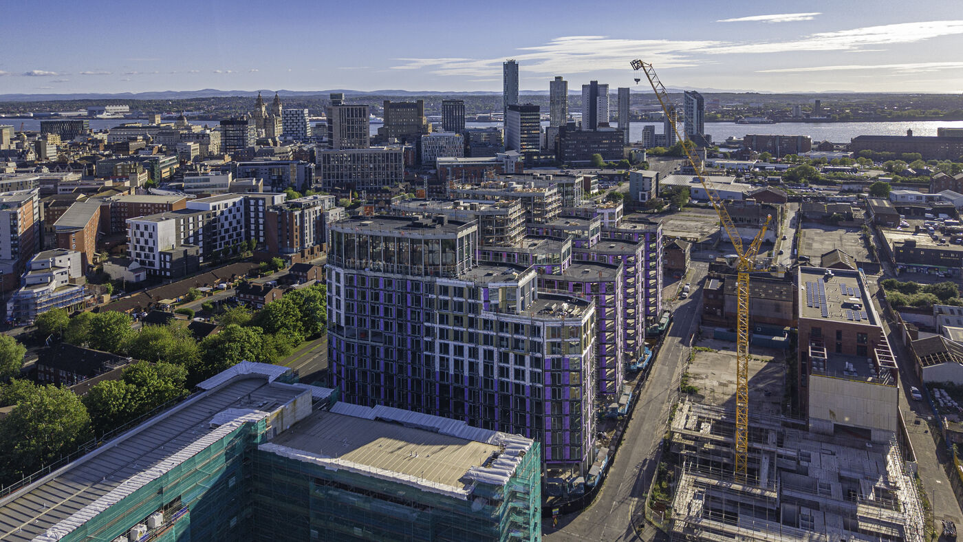 Drone photograph of The Gateway under construction with Liverpool's city centre and the River Mersey beyond